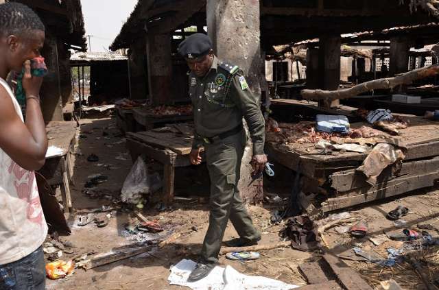 Two female suicide bombers kill at least 30 at Nigerian market